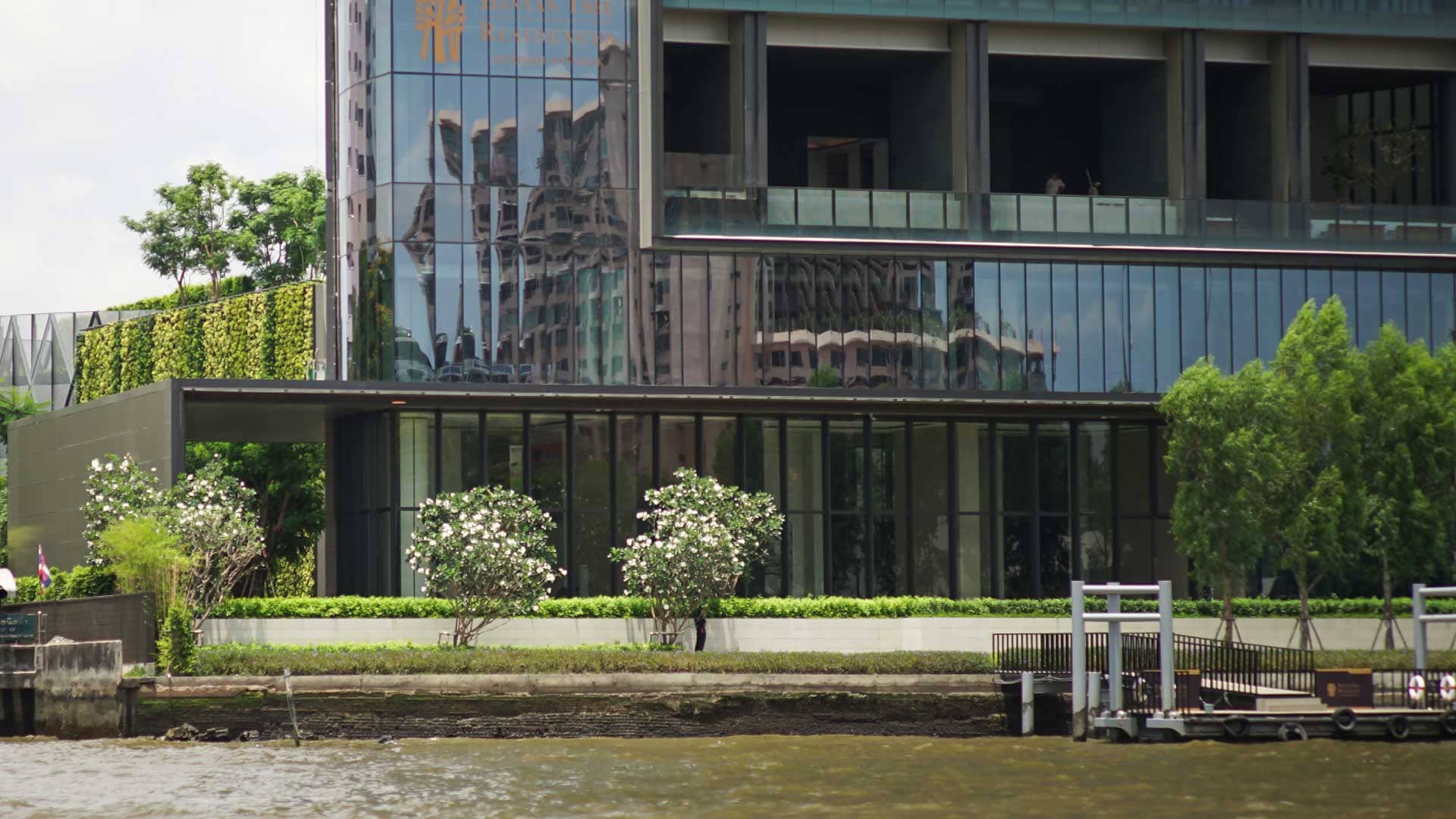 Banyan Tree Residences Riverside Bangkok riverfront podium seen from the Chao Phraya