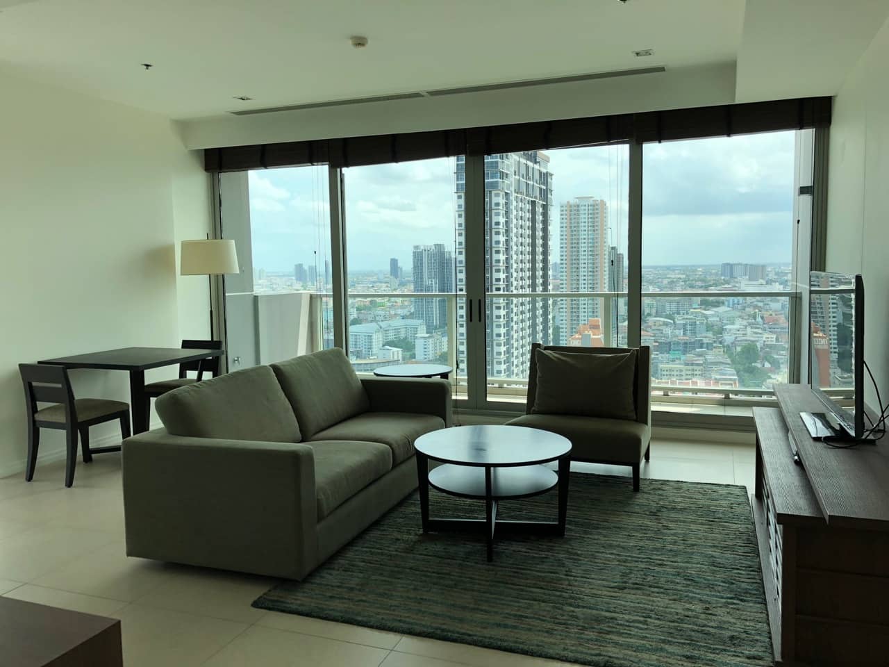 The River Condominium, living room published on the PropertyScout card