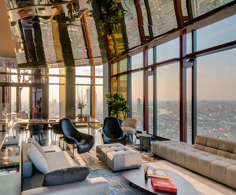 Double-height sky lounge with city view