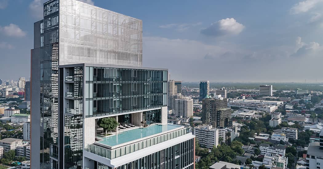 KRAAM Sukhumvit 26 upper floors with rooftop pool, aerial view