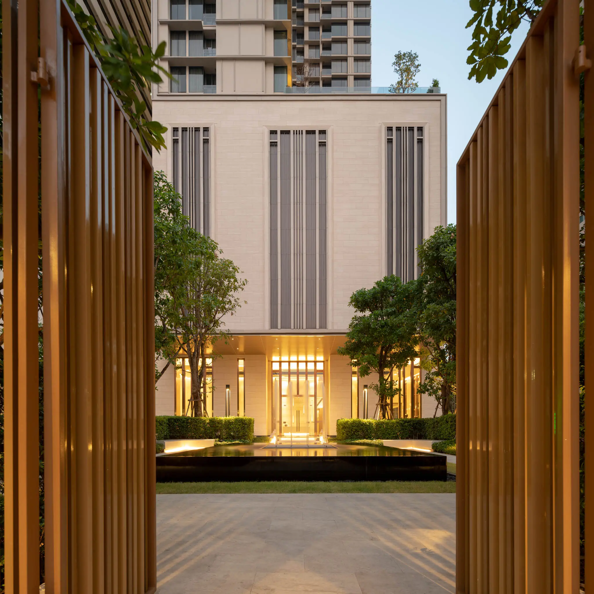 The Esse Asoke facade seen through bronze screens