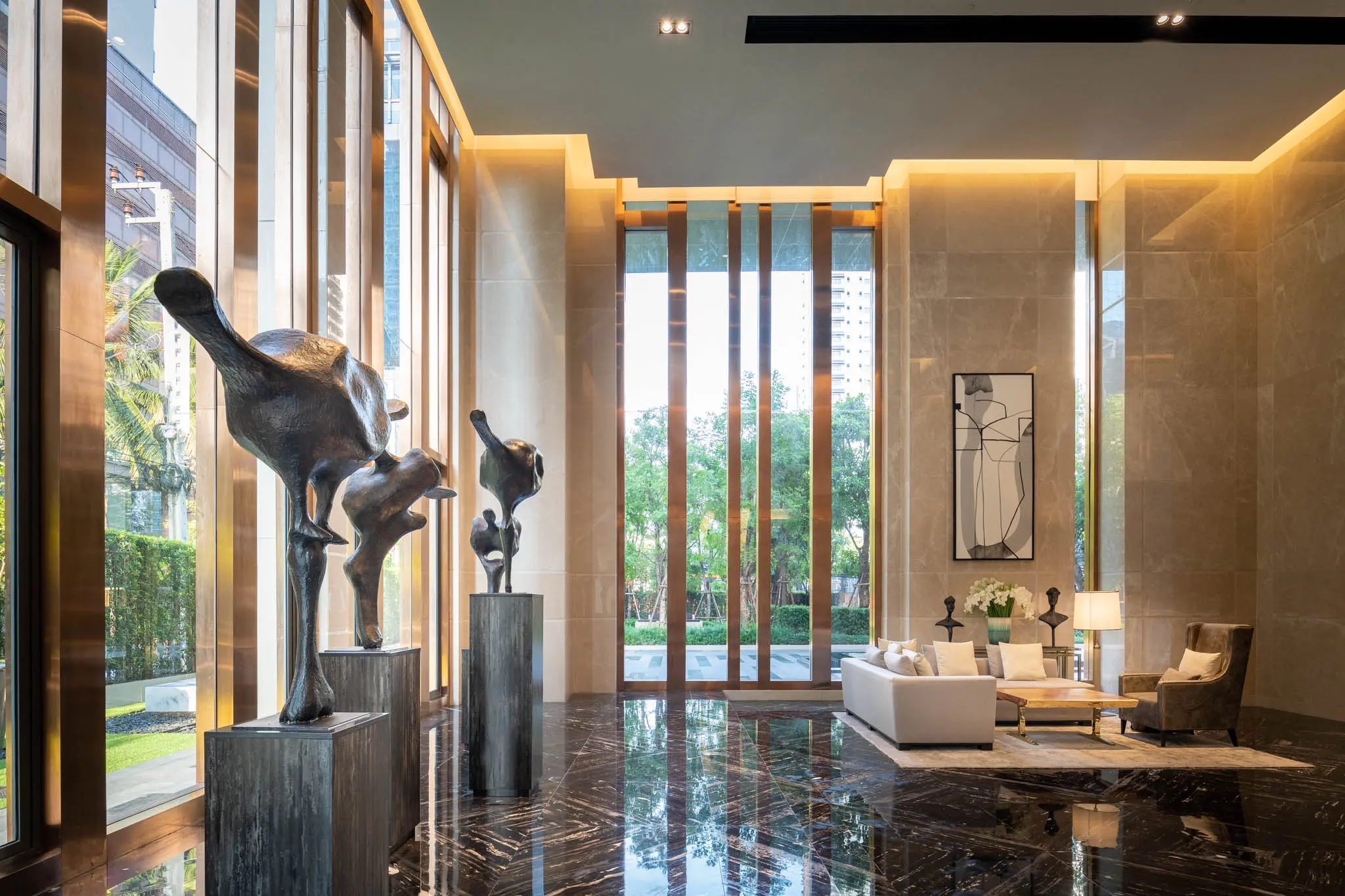 The Esse Asoke double-height lobby with sculpture