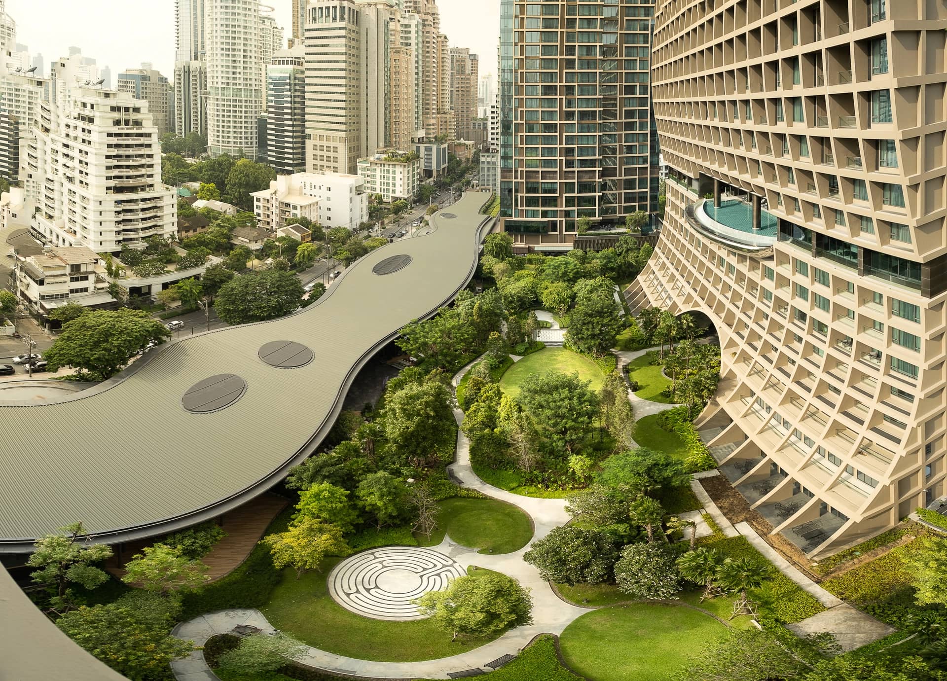 The Residences at Sindhorn Kempinski Hotel Bangkok landscaped garden between the towers