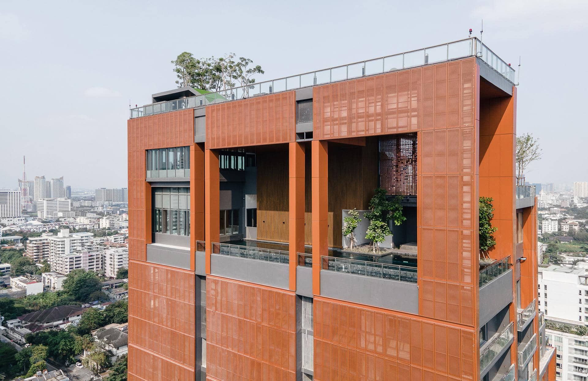 Circle Sukhumvit 31 upper facade with terraces and rooftop greenery