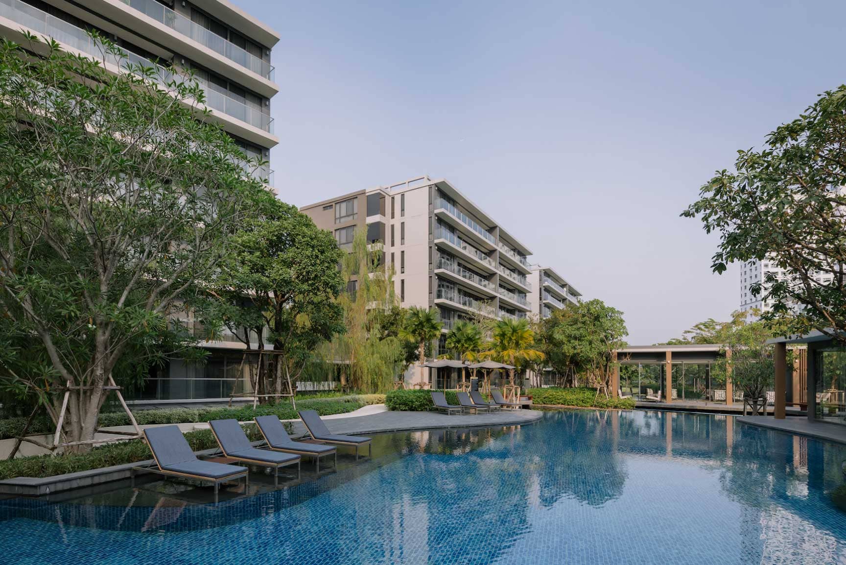 Park Court Sukhumvit 77 swimming pool and low-rise residence buildings