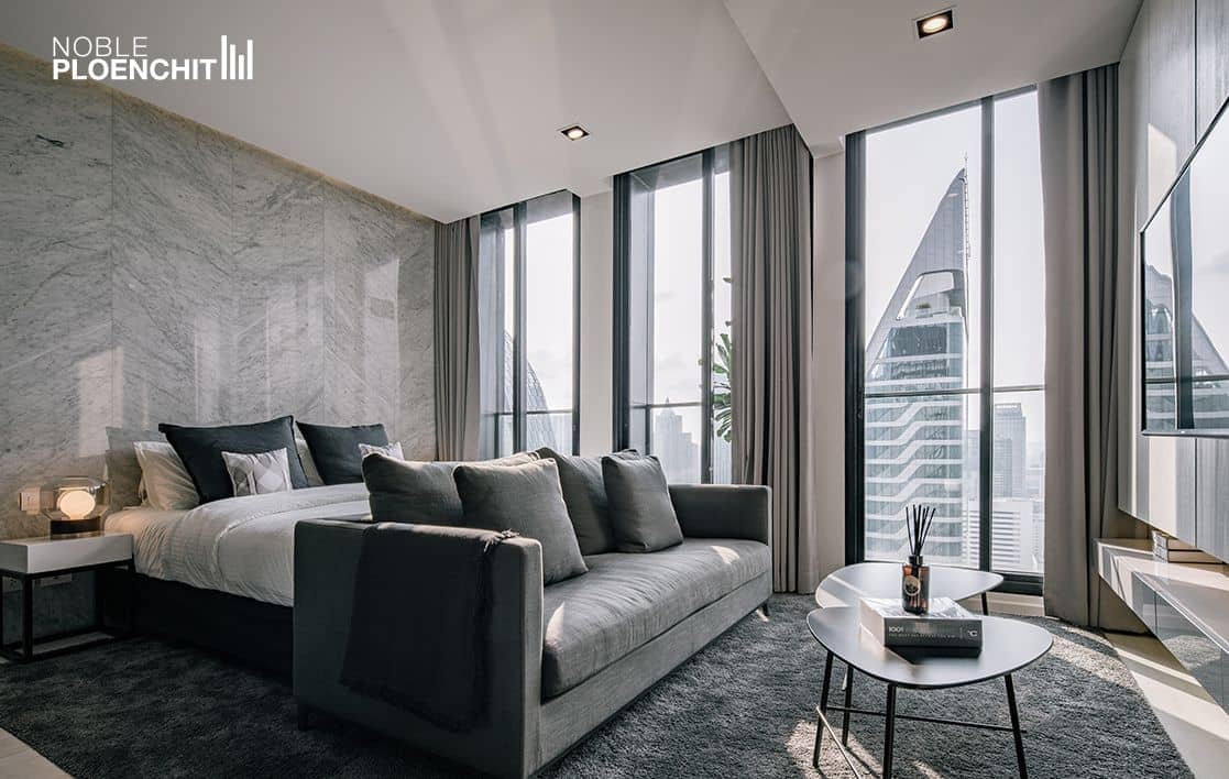 Noble Ploenchit show residence living area with city view