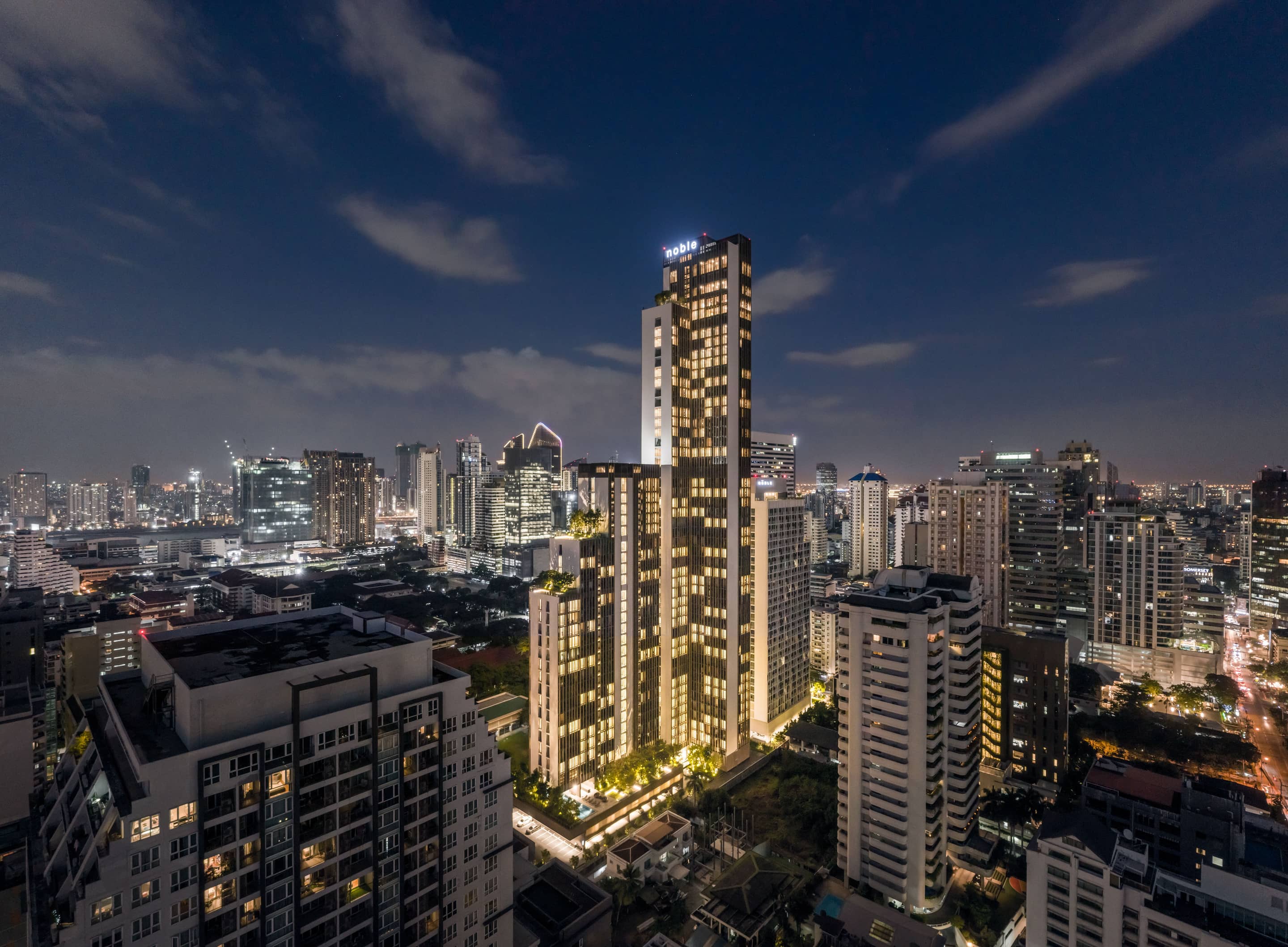 Noble Be Sukhumvit 19: towers at dusk