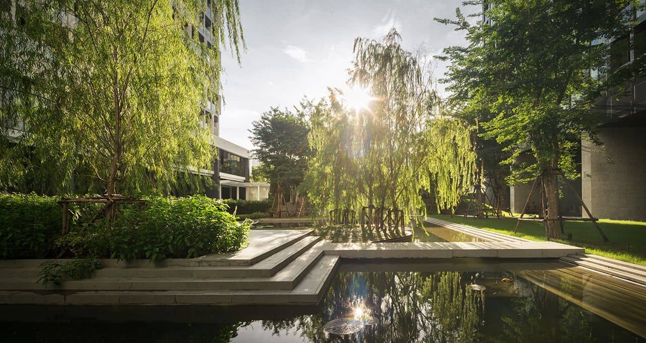 Landscaped garden with reflecting pond at Noble Ploenchit