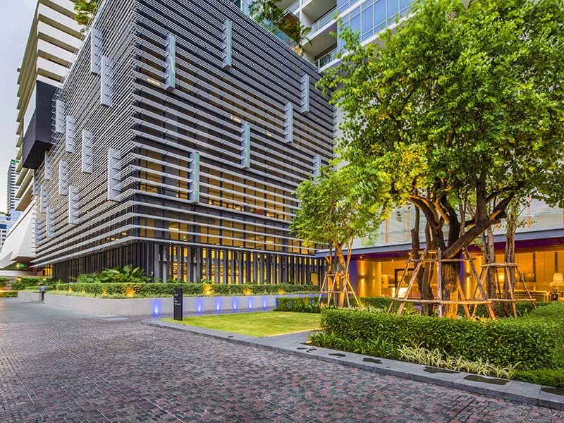 Landscaped entrance driveway at 185 Rajadamri
