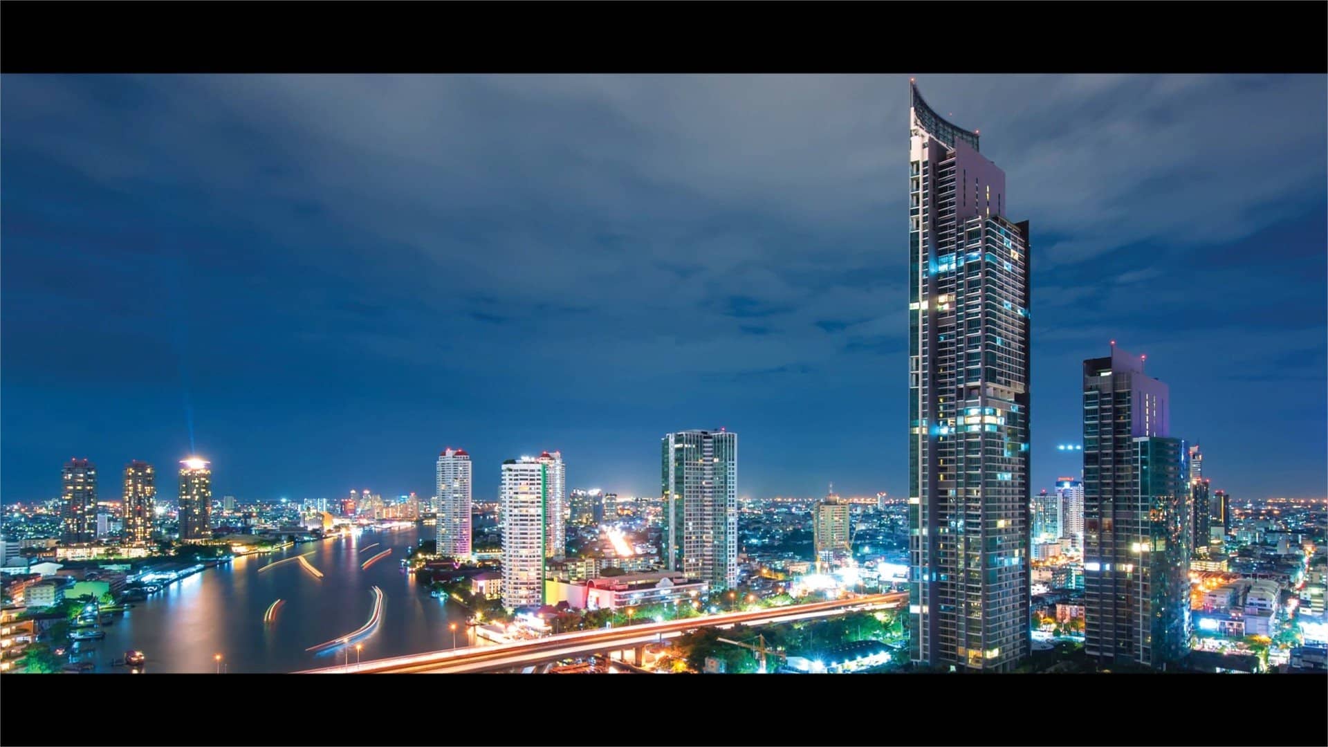 The River towers and riverside skyline at dusk