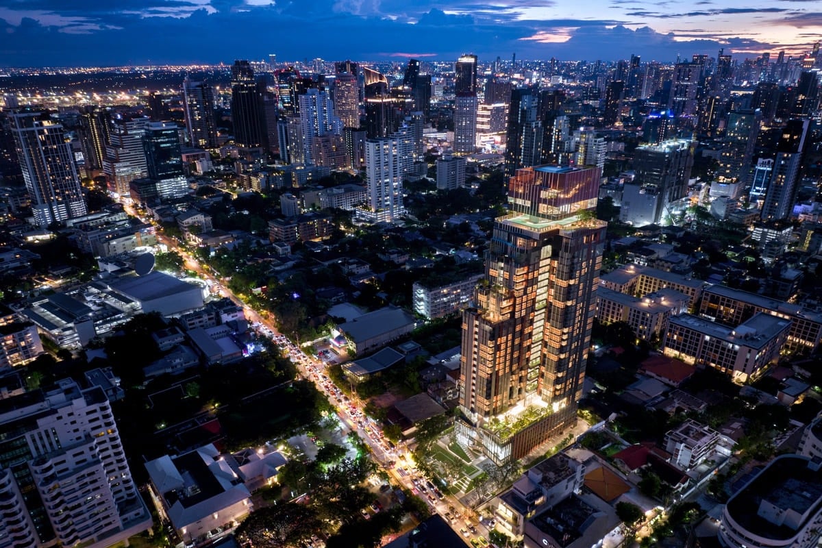 Rhythm Ekkamai Estate tower lit at night seen from above