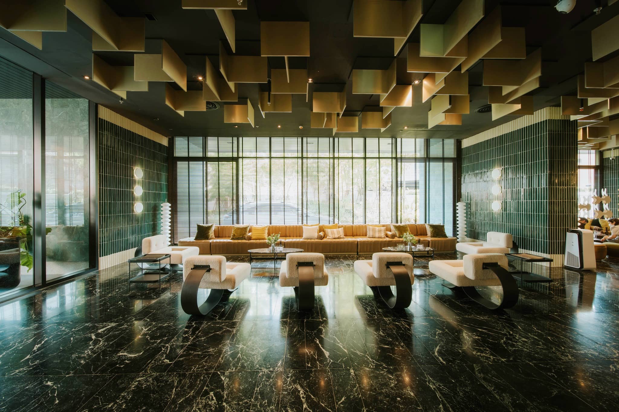 Noble State 39 lobby lounge with sculpted ceiling