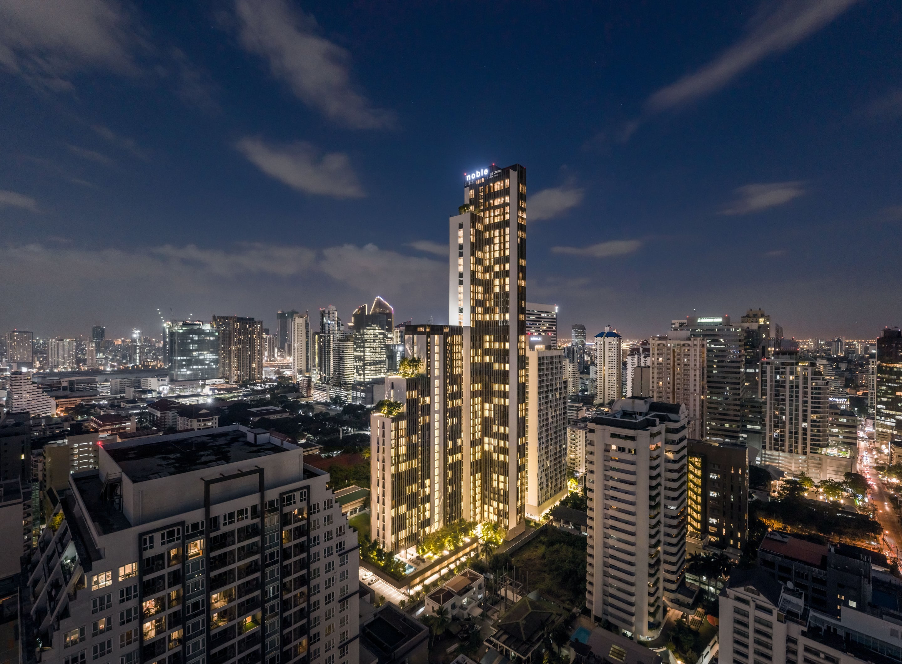 Noble Be Sukhumvit 19: towers at dusk