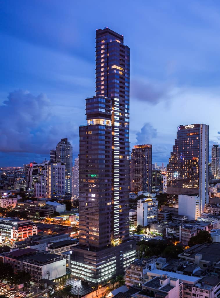 M Silom tower illuminated at dusk