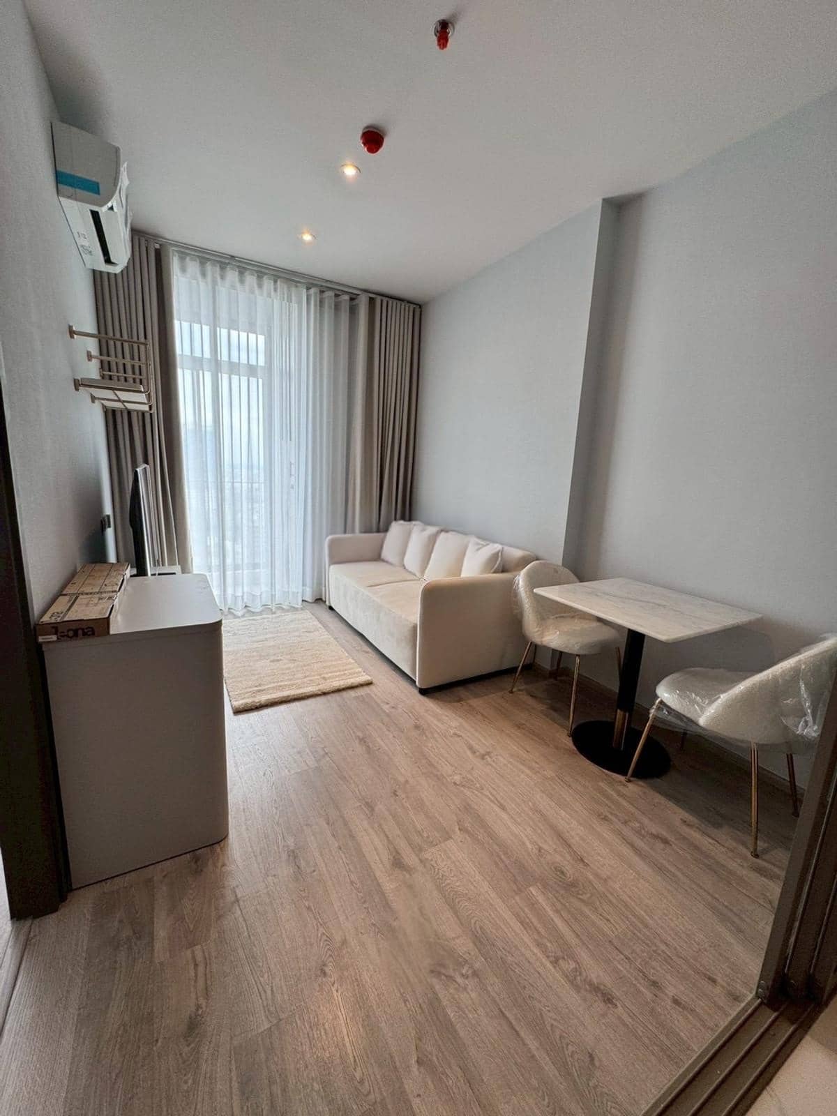 Rhythm Ekkamai Estate, living room published on the PropertyScout card